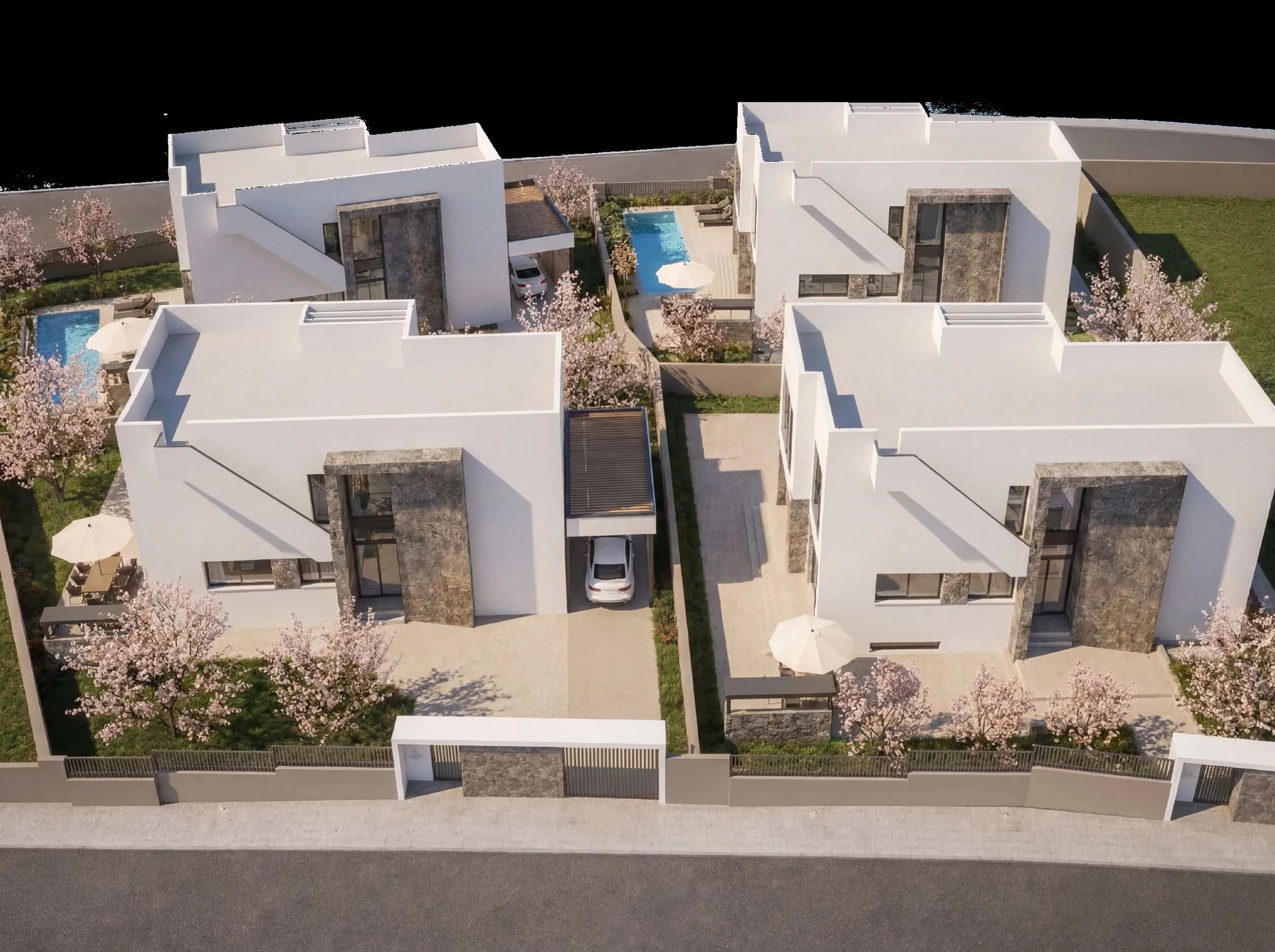 Aerial view of the four Sakura Garten villas with private pools in La Zenia